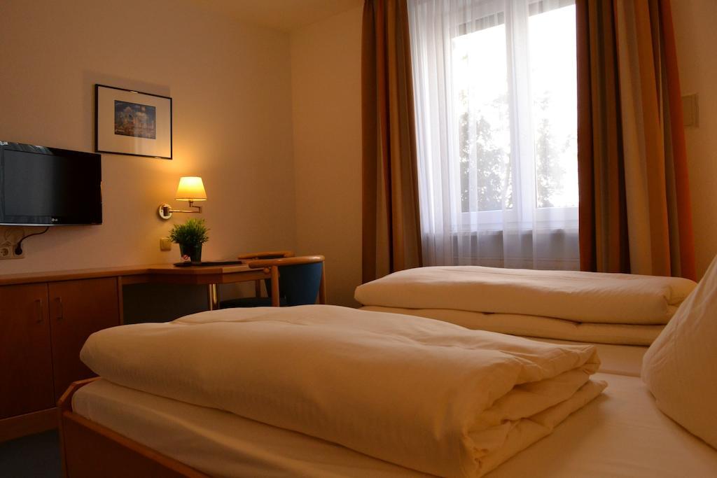 Hotel Am Ostpark Нойбиберг Номер фото